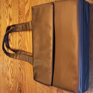 New Brown Vinyl Carry Case. Can be used for work, school or as an overnight bag.